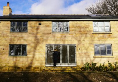 New build property with dark window frames